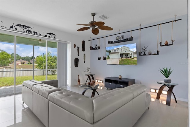 4215 Maplehurst Way, Spring Hill, FL 34609 - living room featuring ceiling fan and light tile patterned flooring
