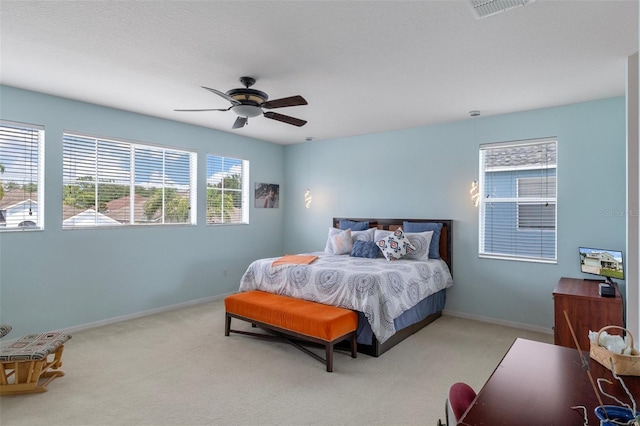 4215 Maplehurst Way, Spring Hill, FL 34609 - carpeted bedroom featuring baseboards and ceiling fan