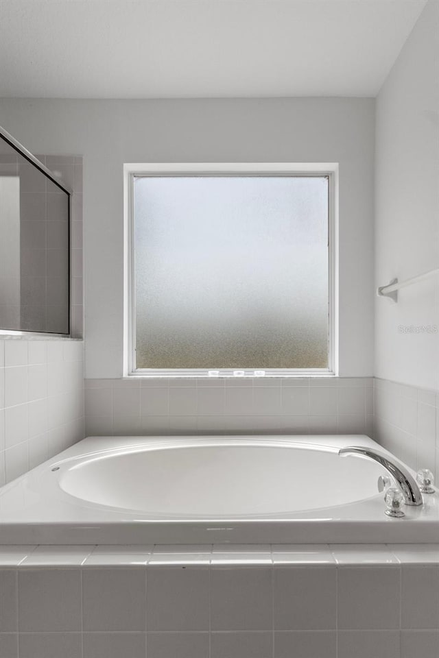 4215 Maplehurst Way, Spring Hill, FL 34609 - bathroom with a garden tub