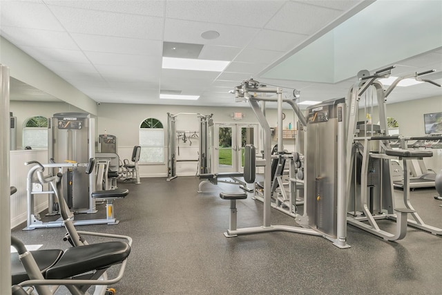 4215 Maplehurst Way, Spring Hill, FL 34609 - gym featuring a drop ceiling and plenty of natural light
