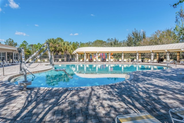 4215 Maplehurst Way, Spring Hill, FL 34609 - community pool featuring a patio