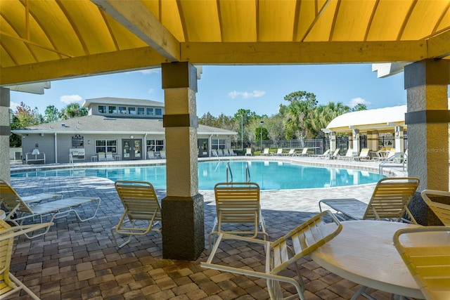 4215 Maplehurst Way, Spring Hill, FL 34609 - community pool featuring a patio