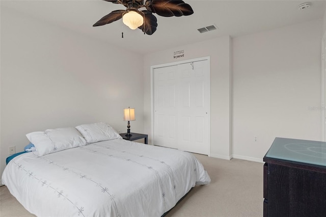 4215 Maplehurst Way, Spring Hill, FL 34609 - bedroom with light colored carpet, baseboards, and ceiling fan