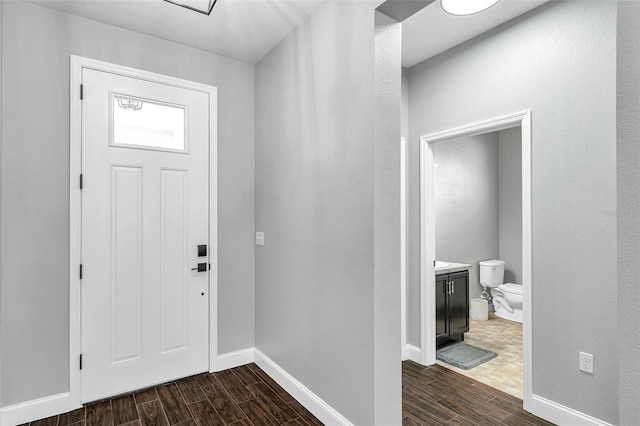 7523 Tangle Brook Blvd, Gibsonton, FL 33534 - entryway with wood tiled floors and baseboards