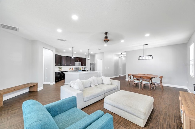 7523 Tangle Brook Blvd, Gibsonton, FL 33534 - living area with baseboards, a ceiling fan, recessed lighting, and dark wood-type flooring