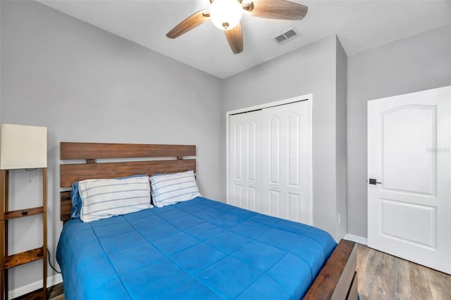 7523 Tangle Brook Blvd, Gibsonton, FL 33534 - bedroom with wood finished floors, a closet, baseboards, and ceiling fan
