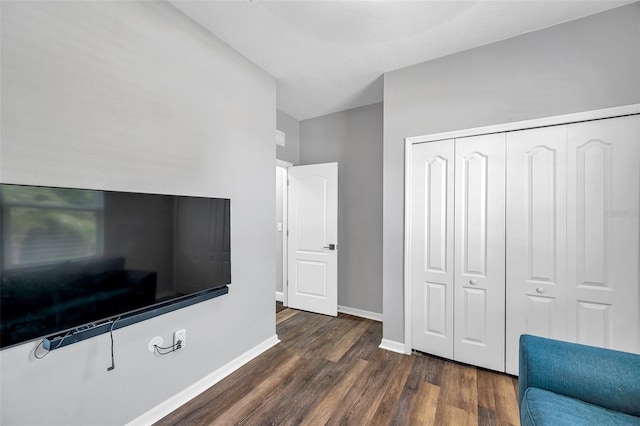 7523 Tangle Brook Blvd, Gibsonton, FL 33534 - living area featuring dark wood finished floors and baseboards