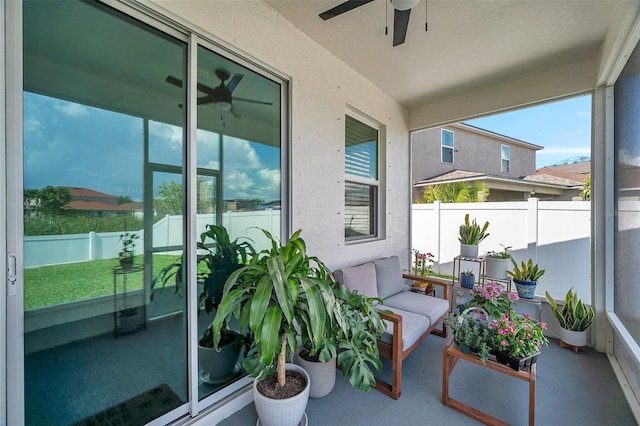 7523 Tangle Brook Blvd, Gibsonton, FL 33534 - balcony with a ceiling fan and an outdoor hangout area