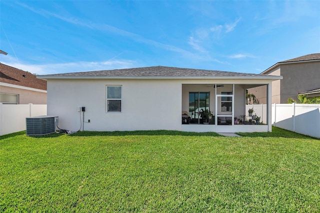 7523 Tangle Brook Blvd, Gibsonton, FL 33534 - rear view of house with central AC unit, a sunroom, stucco siding, and ceiling fan