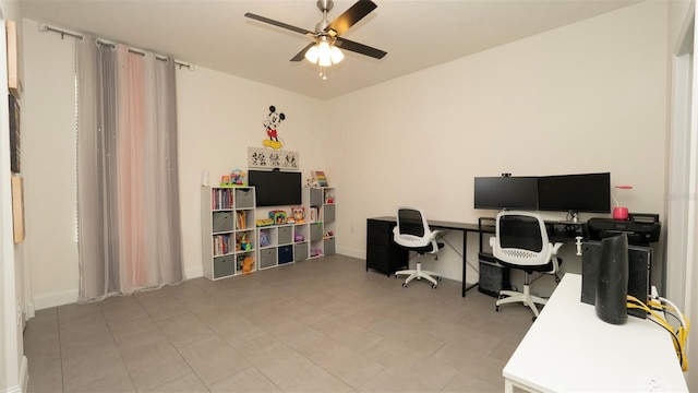 12458 Fish Cove Dr, Spring Hill, FL 34609 - home office featuring a ceiling fan and baseboards