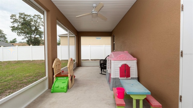 12458 Fish Cove Dr, Spring Hill, FL 34609 - sunroom / solarium with a ceiling fan