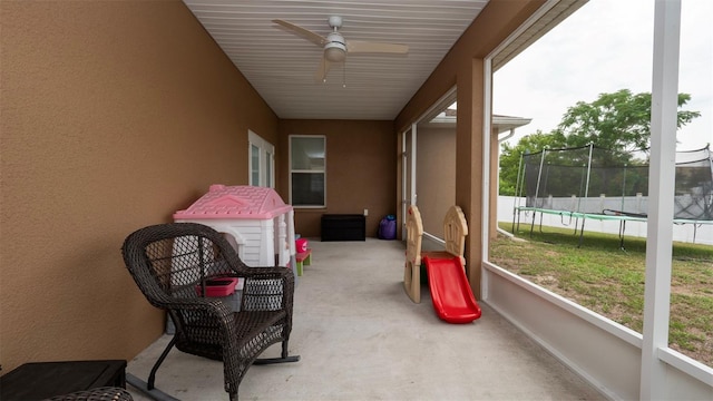 12458 Fish Cove Dr, Spring Hill, FL 34609 - sunroom / solarium featuring a ceiling fan