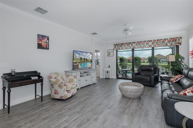 3051 Francoa Dr, Odessa, FL 33556 - living room with ceiling fan, wood finished floors, ornamental molding, and baseboards