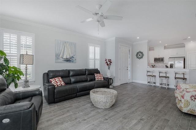 3051 Francoa Dr, Odessa, FL 33556 - living area featuring ceiling fan, ornamental molding, light wood-style flooring, recessed lighting, and baseboards