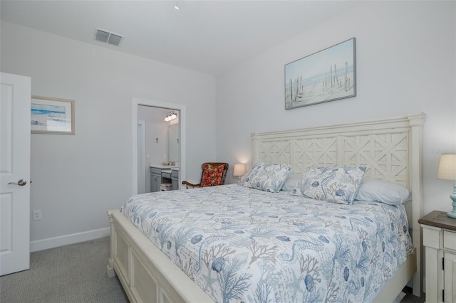3051 Francoa Dr, Odessa, FL 33556 - carpeted bedroom with baseboards and ensuite bathroom