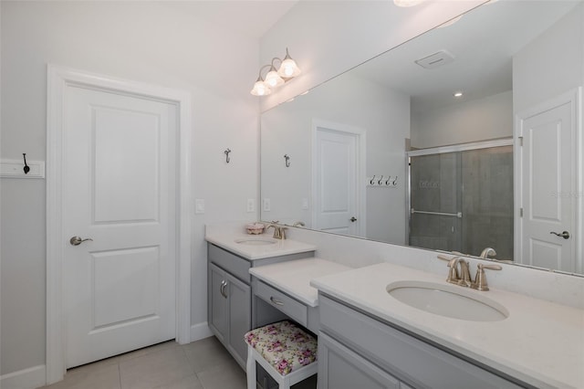 3051 Francoa Dr, Odessa, FL 33556 - bathroom featuring double vanity, a stall shower, tile patterned flooring, and baseboards