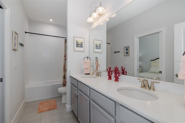 3051 Francoa Dr, Odessa, FL 33556 - ensuite bathroom featuring toilet, double vanity, tile patterned flooring, shower / bath combo, and recessed lighting
