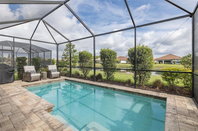 3051 Francoa Dr, Odessa, FL 33556 - outdoor pool with a water view, a patio area, a lanai, and grilling area