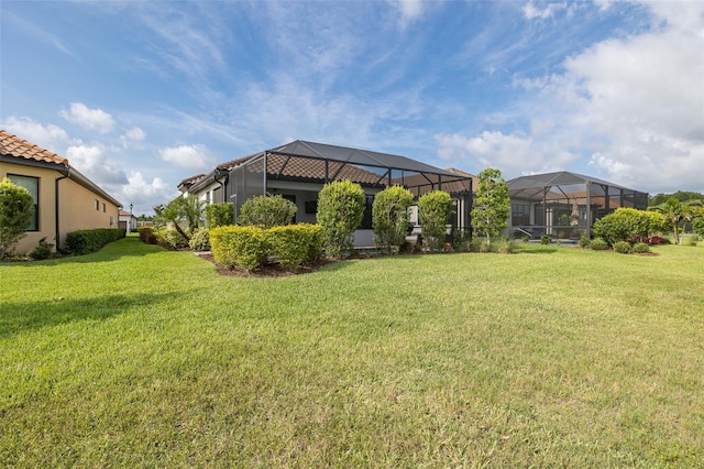 3051 Francoa Dr, Odessa, FL 33556 - view of grassy yard featuring glass enclosure