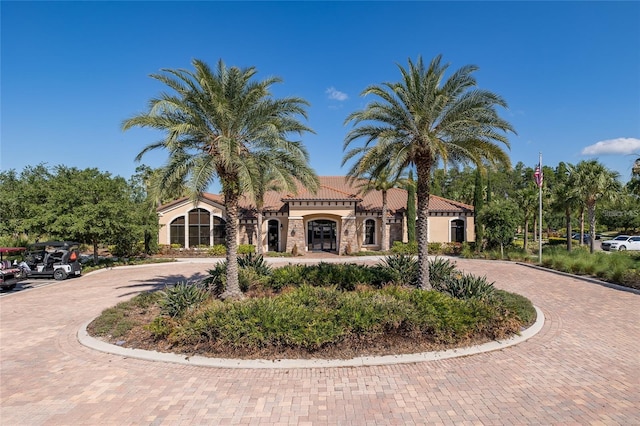 3051 Francoa Dr, Odessa, FL 33556 - view of front of property with curved driveway, a tiled roof, and stucco siding