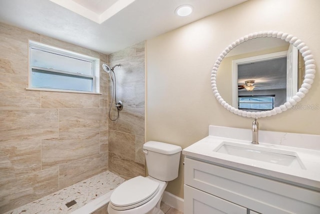 4468 Rudder Way, New Port Richey, FL 34652 - bathroom with vanity, toilet, and a tile shower