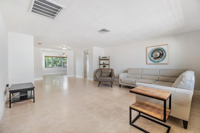 4468 Rudder Way, New Port Richey, FL 34652 - living area featuring baseboards and light tile patterned floors