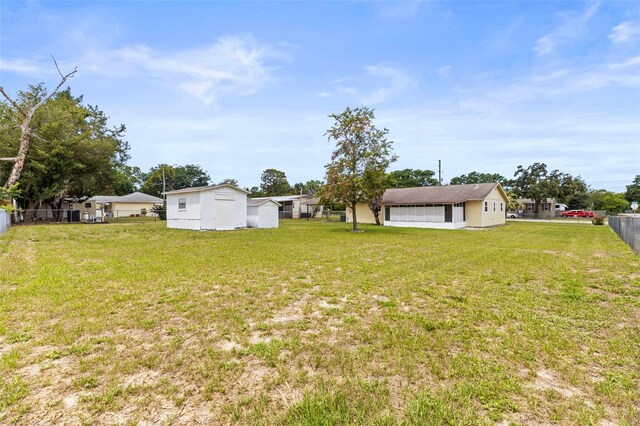 12936 Parkwood St, Hudson, FL 34669 - view of yard with an outbuilding