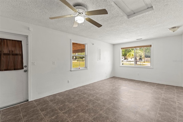 12936 Parkwood St, Hudson, FL 34669 - spare room featuring ceiling fan and a textured ceiling
