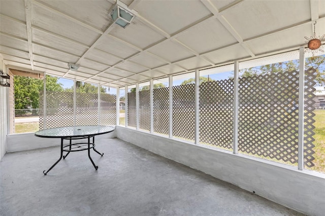 12936 Parkwood St, Hudson, FL 34669 - unfurnished sunroom featuring outdoor dining area