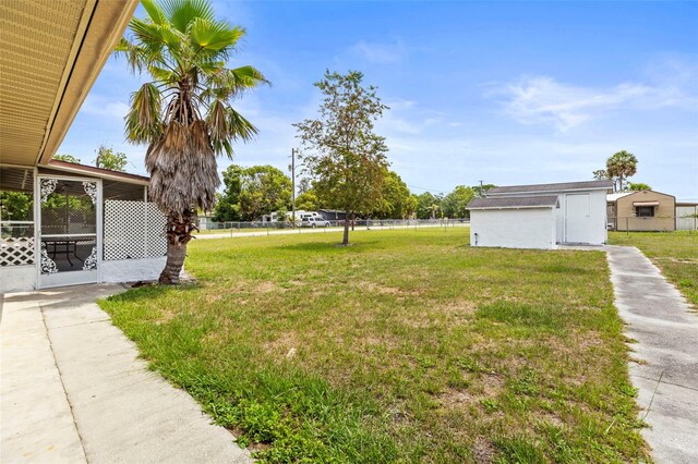 12936 Parkwood St, Hudson, FL 34669 - view of yard featuring an outbuilding