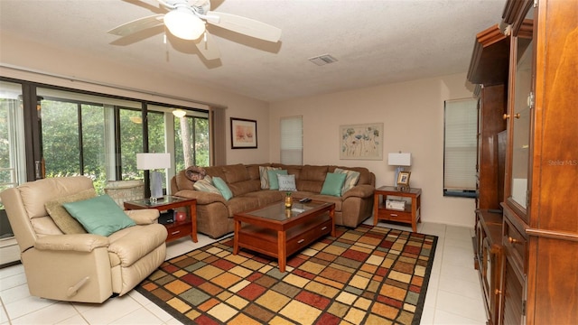 6620 Brambleleaf Dr, Spring Hill, FL 34606 - living room with light tile patterned floors and ceiling fan