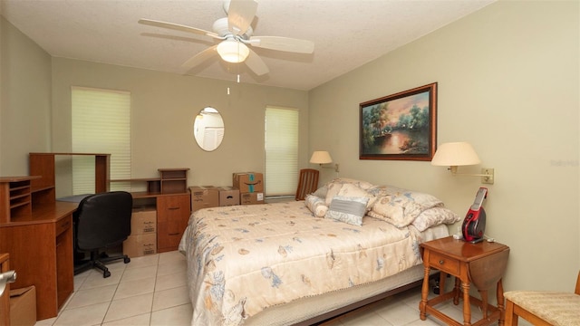 6620 Brambleleaf Dr, Spring Hill, FL 34606 - bedroom featuring light tile patterned flooring, an office area, and ceiling fan