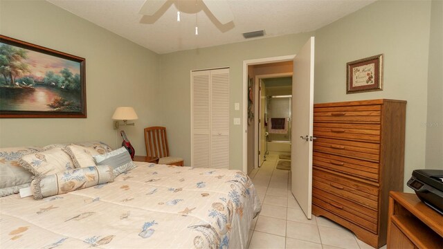 6620 Brambleleaf Dr, Spring Hill, FL 34606 - bedroom with light tile patterned floors, a closet, and ceiling fan