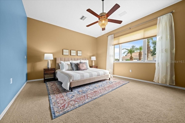 10044 Twelve Oaks Ct, Weeki Wachee, FL 34613 - bedroom with carpet, baseboards, and ceiling fan