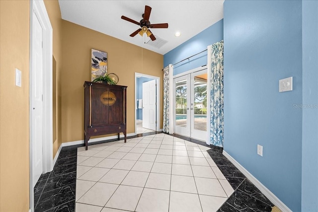 10044 Twelve Oaks Ct, Weeki Wachee, FL 34613 - entrance foyer with french doors, baseboards, and a ceiling fan