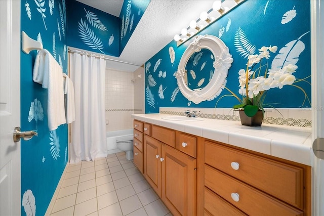 10044 Twelve Oaks Ct, Weeki Wachee, FL 34613 - bathroom featuring tile patterned flooring, vanity, shower / tub combo, and toilet