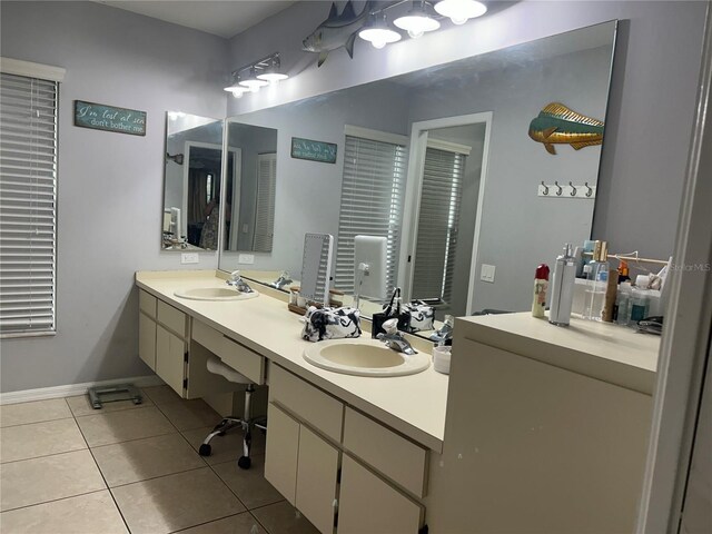 13316 Brigham Ln, Hudson, FL 34667 - full bathroom featuring tile patterned flooring, double vanity, and baseboards