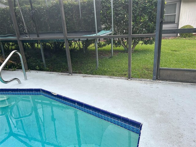 13316 Brigham Ln, Hudson, FL 34667 - swimming pool with a yard and a patio area