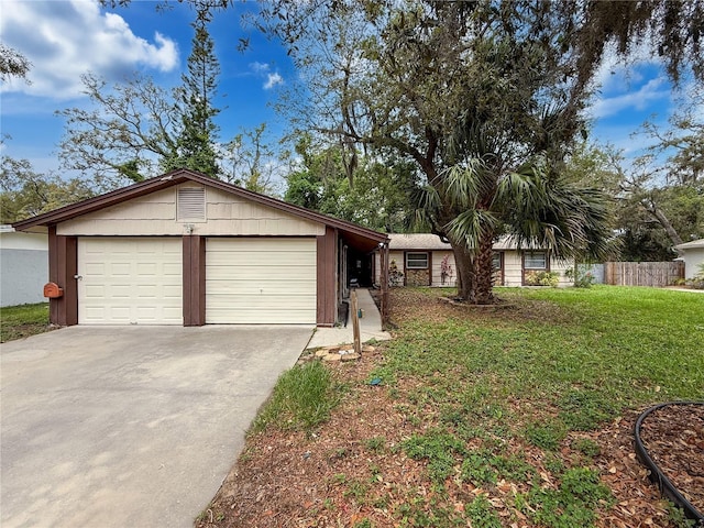 7119 Lenape Cir, New Port Richey, FL 34653 - ranch-style house with concrete driveway and a garage