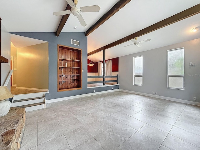 7119 Lenape Cir, New Port Richey, FL 34653 - unfurnished living room with ceiling fan, tile patterned flooring, baseboards, and built in features