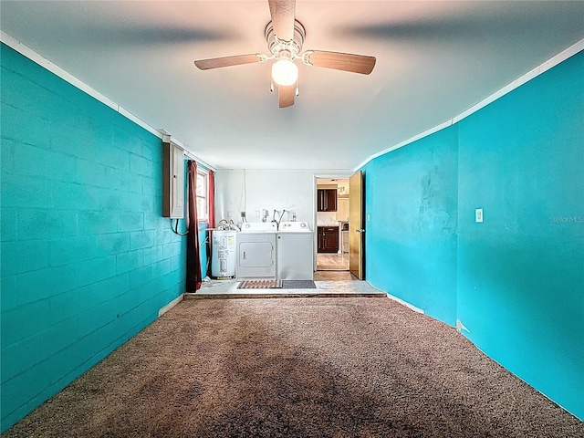7119 Lenape Cir, New Port Richey, FL 34653 - unfurnished living room featuring washing machine and dryer, electric water heater, a ceiling fan, concrete block wall, and carpet floors