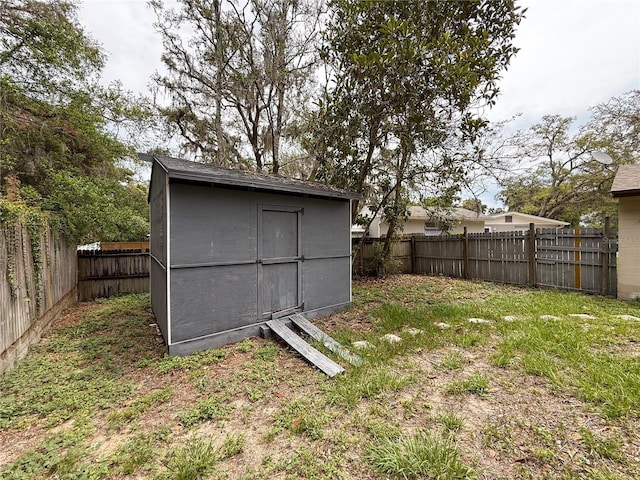 7119 Lenape Cir, New Port Richey, FL 34653 - view of shed featuring a fenced backyard