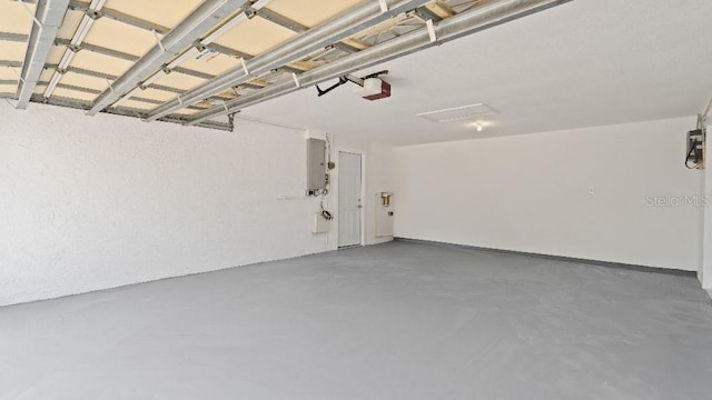 1024 Spindle Palm Way, Apollo Beach, FL 33572 - garage with electric panel and a garage door opener