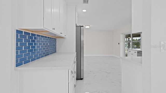 1024 Spindle Palm Way, Apollo Beach, FL 33572 - corridor featuring light marble finish flooring, recessed lighting, and baseboards