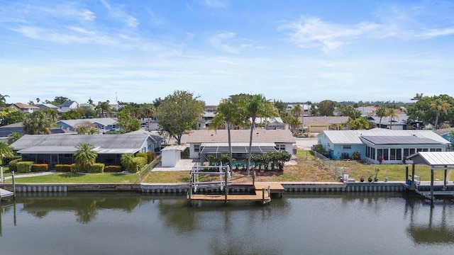 1024 Spindle Palm Way, Apollo Beach, FL 33572 - rear view of house featuring a residential view and a water view
