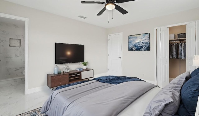 1024 Spindle Palm Way, Apollo Beach, FL 33572 - bedroom with marble finish flooring, baseboards, a closet, connected bathroom, and a ceiling fan