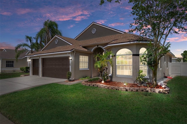 1862 Wood Bend St, Tarpon Springs, FL 34689 - ranch-style house featuring stucco siding, a garage, concrete driveway, and roof with shingles