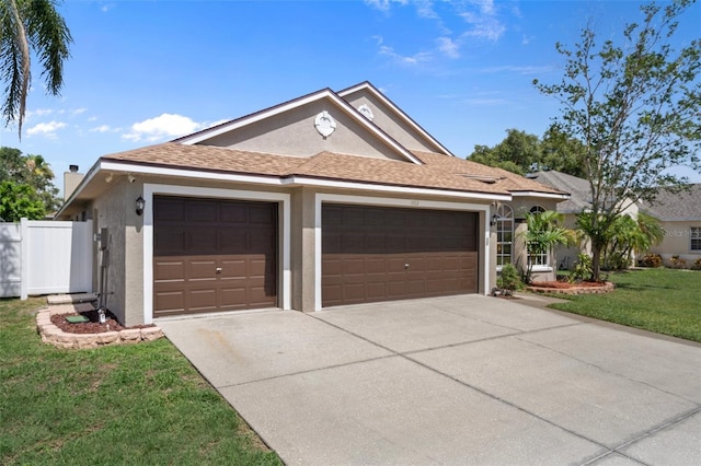 1862 Wood Bend St, Tarpon Springs, FL 34689 - single story home with an attached garage, driveway, stucco siding, and roof with shingles