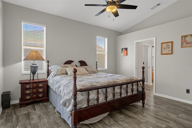 1862 Wood Bend St, Tarpon Springs, FL 34689 - bedroom with lofted ceiling, baseboards, and ceiling fan