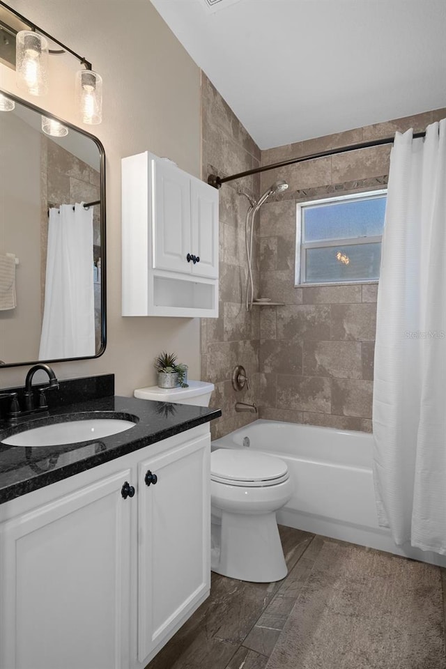 1862 Wood Bend St, Tarpon Springs, FL 34689 - bathroom with vanity, shower / bath combo with shower curtain, toilet, and vaulted ceiling